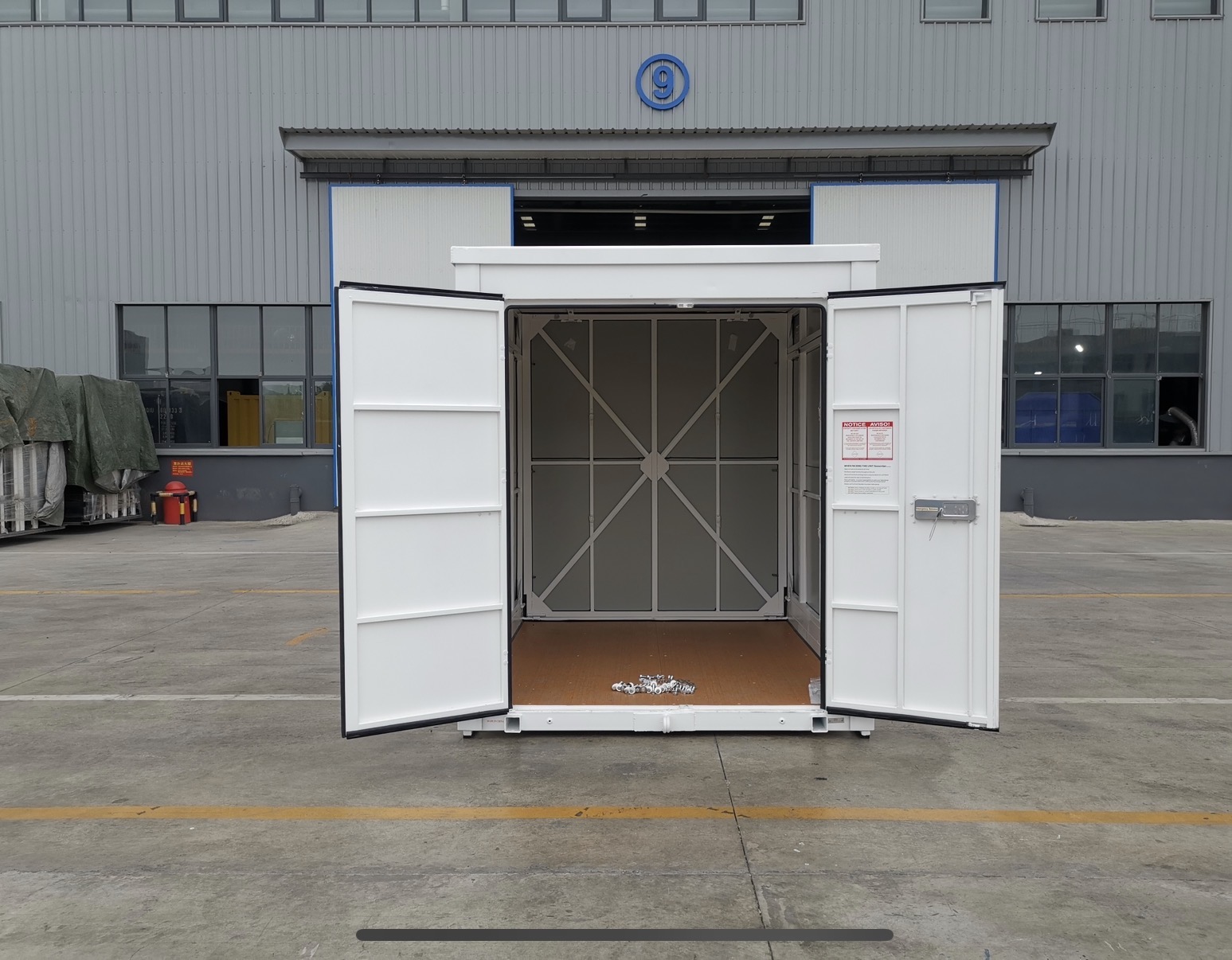 One Stop portable storage container with its doors open at ground level