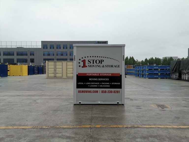 Front of a closed One Stop Moving & Storage portable storage container standing on a paved lot